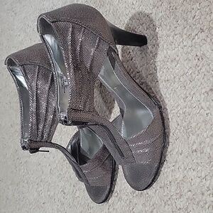 apostrophe silver sparkley shoes.  Zipper front.  Size is 7.5.